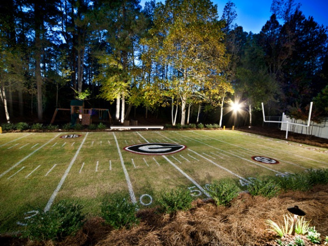 Mini football field in backyard